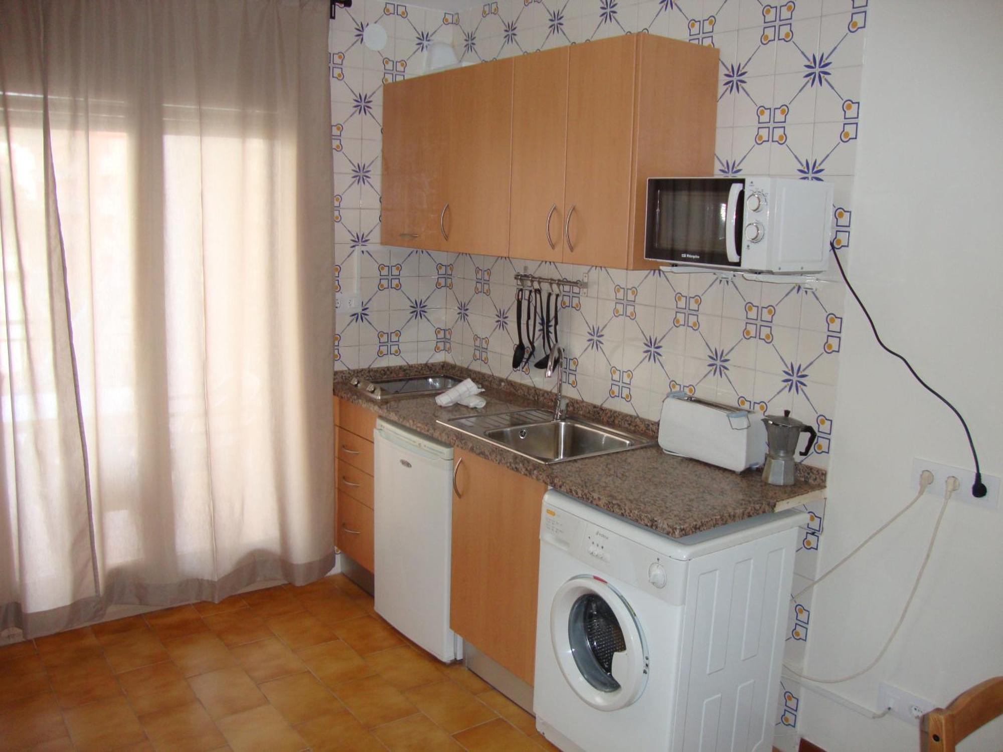 Apartaments Claudi Tossa de Mar Pokoj fotografie